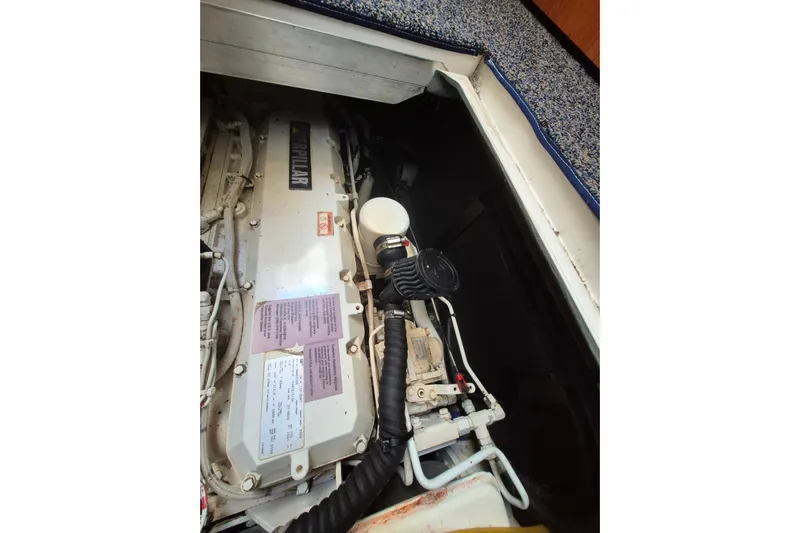 Funny Cide Yacht Photos Pics Engine compartment of a 1999 Sea Ray 420 Aft Cabin boat, featuring a Caterpillar engine.