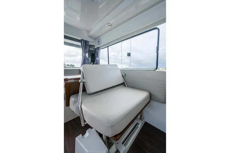 Yacht Photos Pics Interior seating of 2021 Jeanneau NC Sport 895 boat, featuring modern design and comfort.
