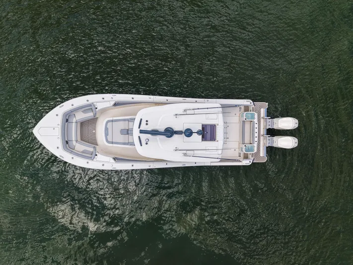 Lucky 24 II Yacht Photos Pics Aerial view of 2023 Scout 400 LXF boat on water.