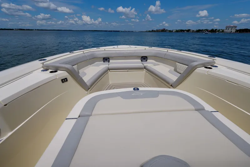 Lucky 24 II Yacht Photos Pics 2023 Scout 400 LXF boat interior with luxurious seating on a sunny day.