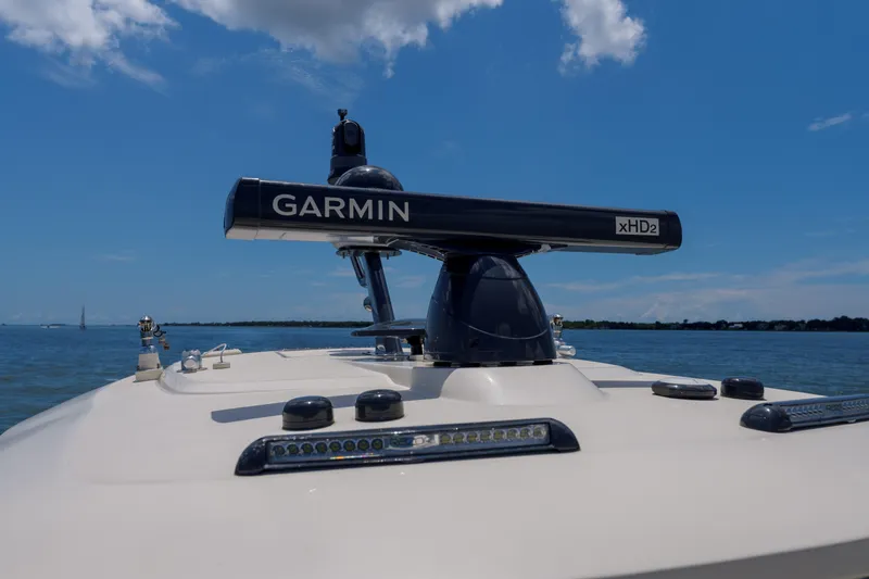 Lucky 24 II Yacht Photos Pics 2023 Scout 400 LXF boat with Garmin xHD2 radar on a sunny day.