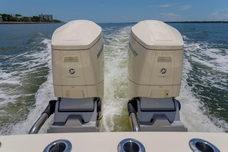 Lucky 24 II Yacht Photos Pics 2023 Scout 400 LXF boat with dual Mercury outboard engines on open water.