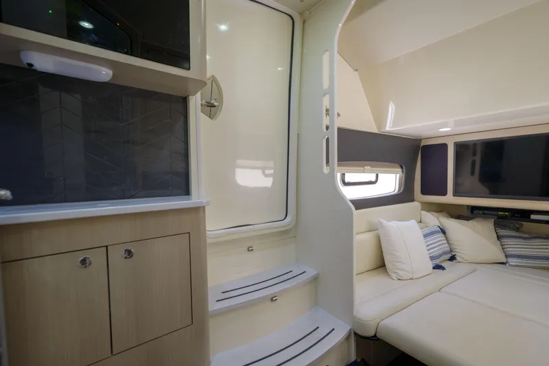 Lucky 24 II Yacht Photos Pics Luxurious interior of 2023 Scout 400 LXF boat with cozy seating and modern amenities.