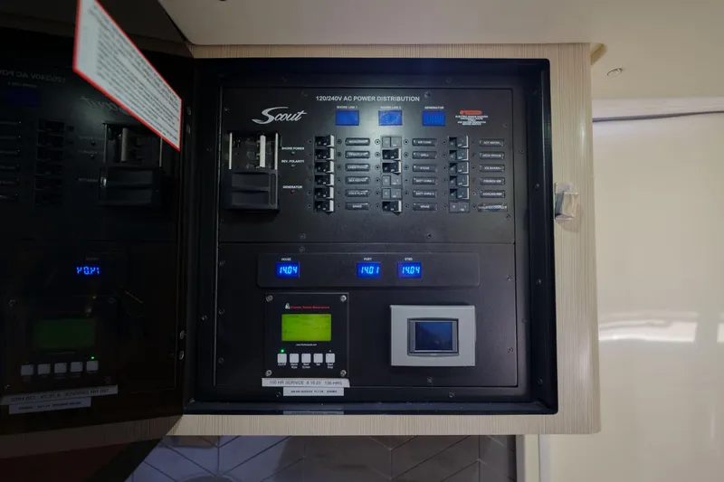 Lucky 24 II Yacht Photos Pics Electrical panel of 2023 Scout 400 LXF boat, featuring power distribution controls.