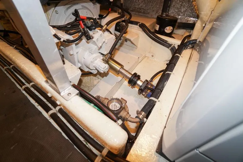 Nautilus Yacht Photos Pics Engine compartment of a 2008 Navigator 5100 boat, showcasing mechanical components and wiring.