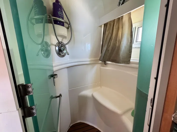  Yacht Photos Pics Shower area in 1996 Carver 500 Cockpit Motor Yacht with seating and toiletries.