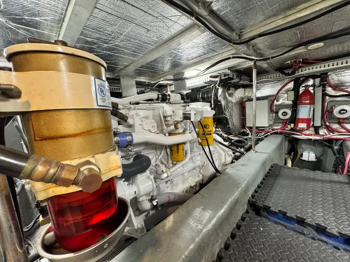  Yacht Photos Pics Engine room of 1996 Carver 500 Cockpit Motor Yacht with visible components and wiring.