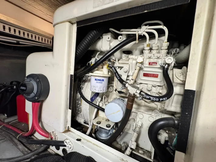  Yacht Photos Pics Engine compartment of a 1996 Carver 500 Cockpit Motor Yacht, featuring Kohler components.