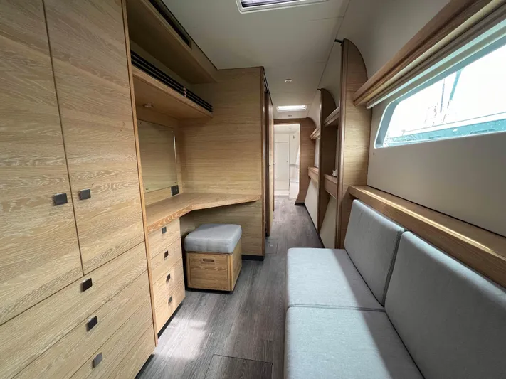 Levante Yacht Photos Pics Luxurious interior of 2022 Xquisite Yachts X5 PLUS with modern wood finish and seating area.