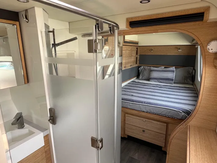 Levante Yacht Photos Pics Luxurious interior of 2022 Xquisite Yachts X5 PLUS with modern bedroom and bathroom.