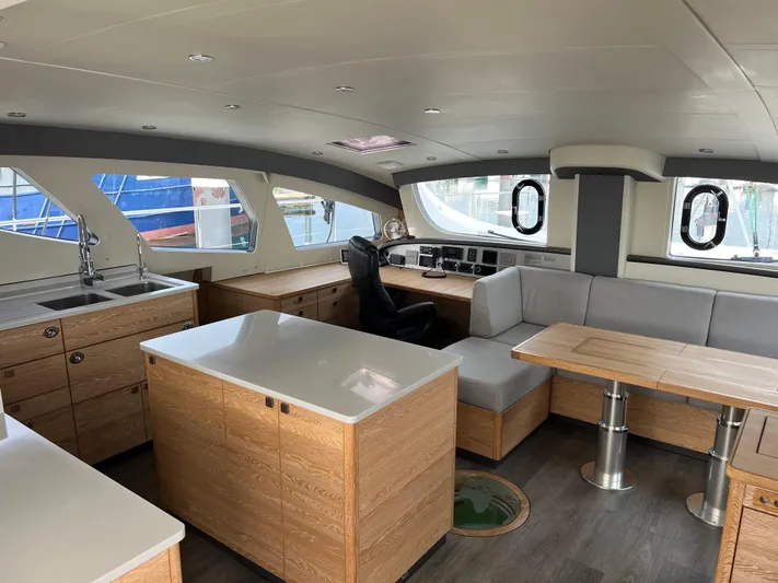 Levante Yacht Photos Pics Luxurious interior of 2022 Xquisite Yachts X5 PLUS with modern furnishings and panoramic windows.