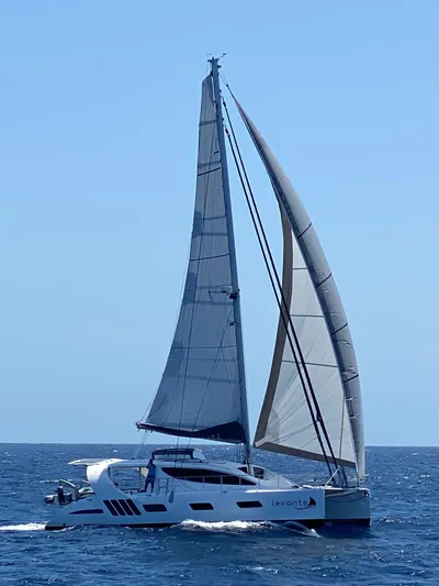 Levante Yacht Photos Pics 2022 Xquisite Yachts X5 PLUS sailing on open sea under clear blue sky.
