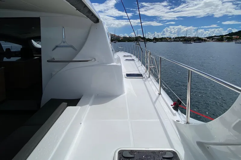 Levante Yacht Photos Pics 2022 Xquisite Yachts X5 PLUS deck with scenic water view and clear skies.