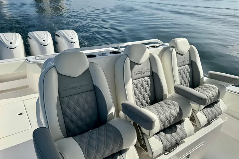 All Eyez On Me Yacht Photos Pics 2024 Invincible 39 Open Fisherman boat with luxurious seating and multiple engines.