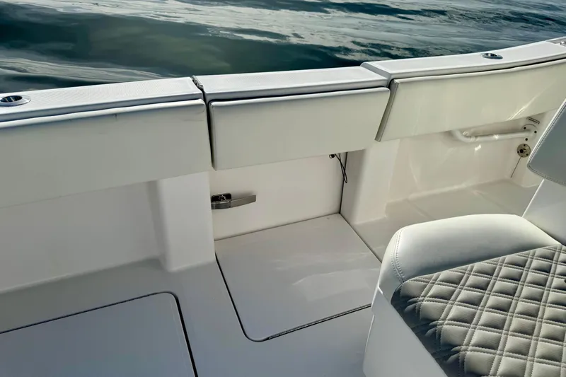All Eyez On Me Yacht Photos Pics 2024 Invincible 39 Open Fisherman boat interior with cushioned seating and sleek design.