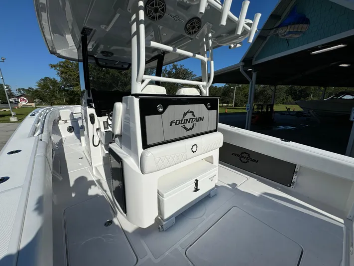  Yacht Photos Pics 2025 Fountain 38TE boat interior with seating and storage, showcasing sleek design and functionality.