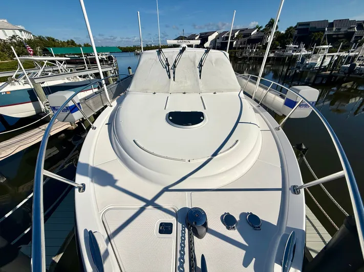  Yacht Photos Pics 2008 Tiara Yachts 3500 Sovran on a sunny dock.