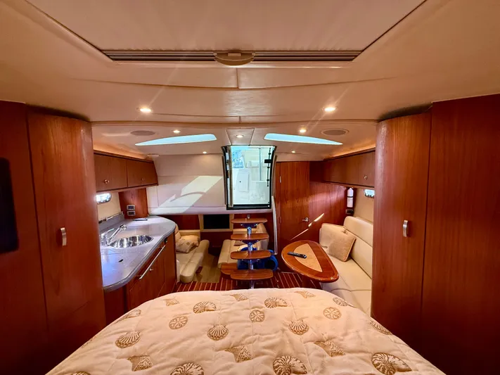 Yacht Photos Pics Interior of 2008 Tiara Yachts 3500 Sovran with kitchen and seating area.