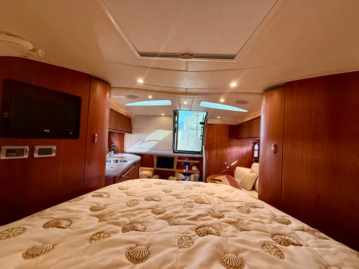  Yacht Photos Pics Interior of 2008 Tiara Yachts 3500 Sovran with bed and wooden furnishings.