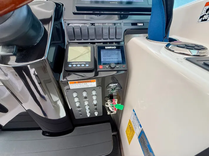  Yacht Photos Pics 2008 Tiara Yachts 3500 Sovran dashboard with controls and displays.