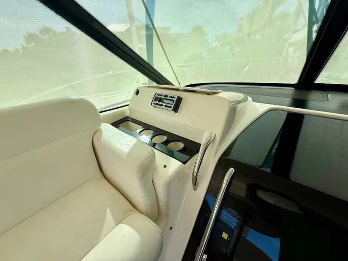  Yacht Photos Pics Interior of 2008 Tiara Yachts 3500 Sovran with seat and control panel.