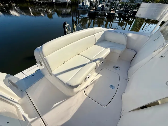  Yacht Photos Pics 2008 Tiara Yachts 3500 Sovran with white seating area by the water.