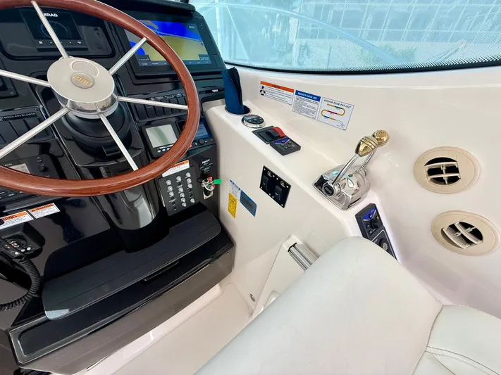  Yacht Photos Pics Tiara Yachts 3500 Sovran 2008 helm with wooden steering wheel.