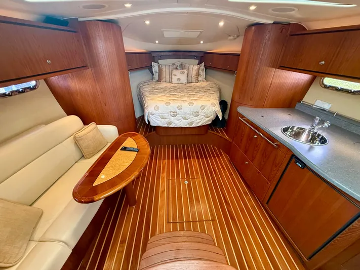  Yacht Photos Pics Interior of 2008 Tiara Yachts 3500 Sovran with wood flooring and bed.