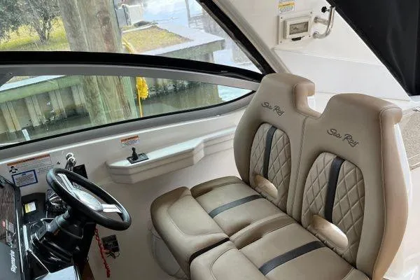  Yacht Photos Pics Interior of 2017 Sea Ray Sundancer 350 with dual helm seats and steering wheel.