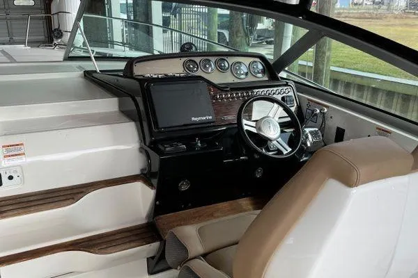  Yacht Photos Pics 2017 Sea Ray Sundancer 350 helm with modern controls and navigation system.