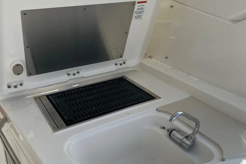  Yacht Photos Pics Outdoor sink and grill on a 2020 Pursuit DC 365 boat.