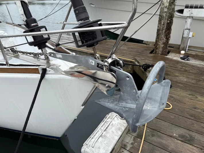 Imagine Yacht Photos Pics Bow of a 1990 J Boats J/44 with anchor and dock in view.