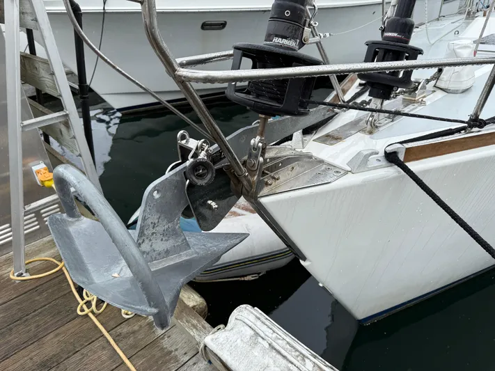 Imagine Yacht Photos Pics Bow of a 1990 J Boats J/44 with anchor and docked at marina.