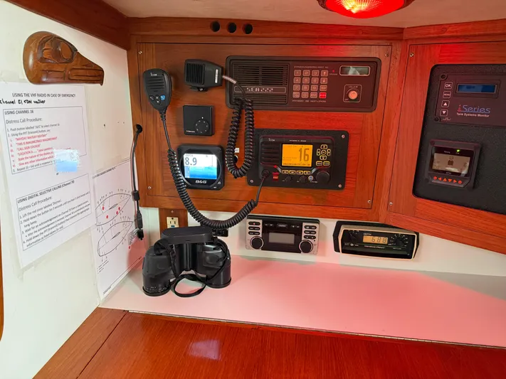 Imagine Yacht Photos Pics Navigation equipment panel on a 1990 J Boats J/44 sailboat, featuring radios and instruments.