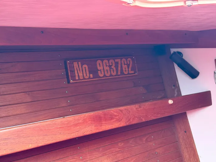 Imagine Yacht Photos Pics Wooden interior of 1990 J Boats J/44 with number 963762 displayed.