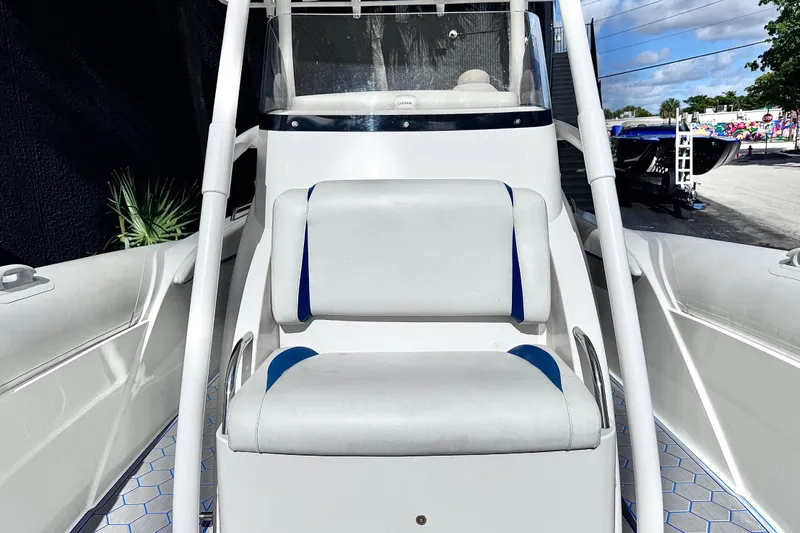  Yacht Photos Pics White Airship 330 boat interior with cushioned seating, 2014 model.