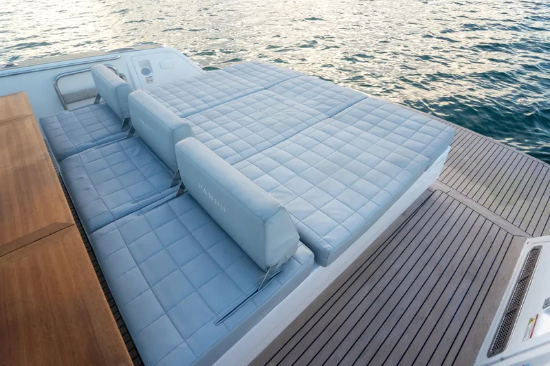 Katerina Yacht Photos Pics Luxurious sunbed on 2021 Pardo Yachts 43, overlooking serene ocean waters.