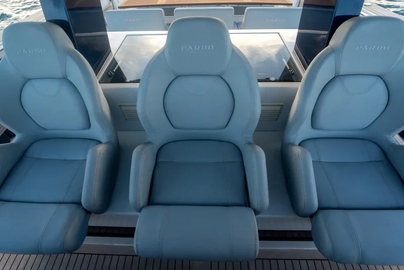 Katerina Yacht Photos Pics Luxury seating on 2021 Pardo Yachts 43, featuring three elegant, cushioned chairs.