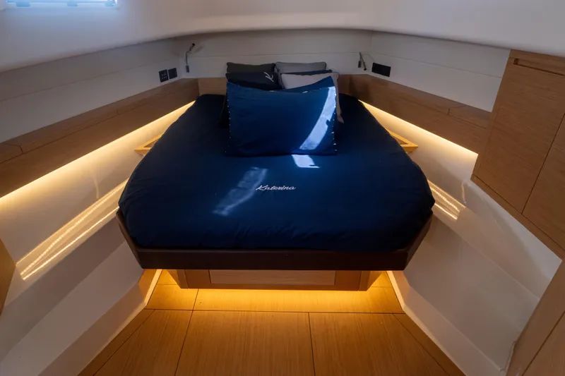 Katerina Yacht Photos Pics Luxurious cabin interior of 2021 Pardo Yachts 43 with ambient lighting and cozy bedding.