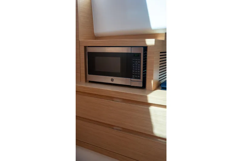 Katerina Yacht Photos Pics Microwave in Pardo Yachts 43, 2021 model, wooden cabinetry.