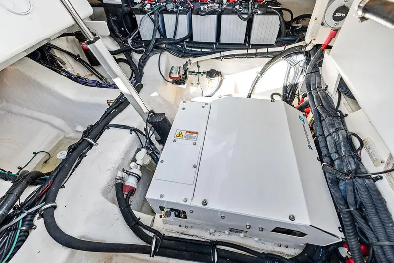  Yacht Photos Pics Engine compartment of 2021 Sea Ray 350 SLX OB with visible wiring and components.