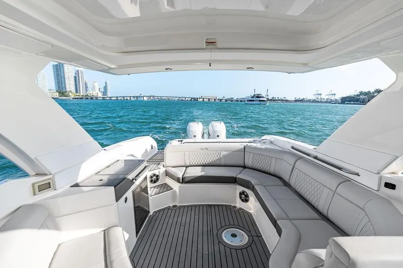  Yacht Photos Pics 2021 Sea Ray 350 SLX OB luxury boat interior with ocean view and modern seating.