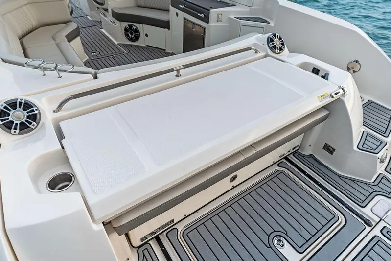  Yacht Photos Pics 2021 Sea Ray 350 SLX OB boat interior with seating and deck details.