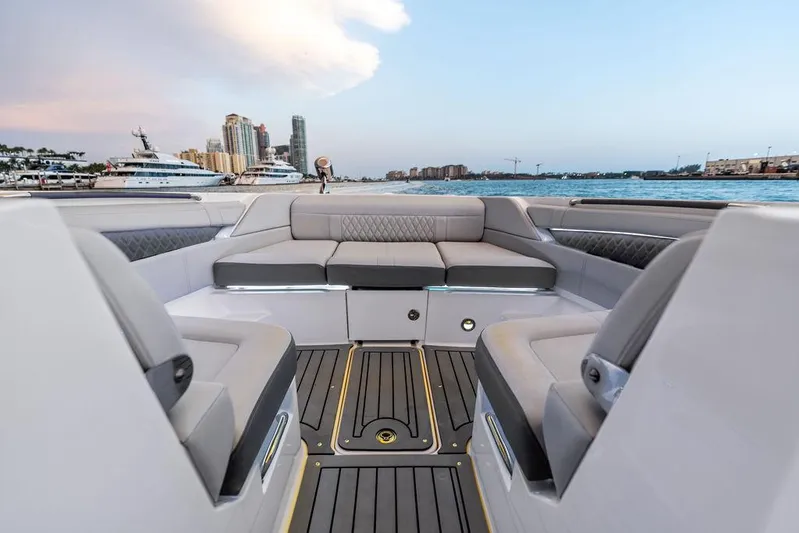  Yacht Photos Pics 2021 Sea Ray 350 SLX OB boat interior with waterfront cityscape view.