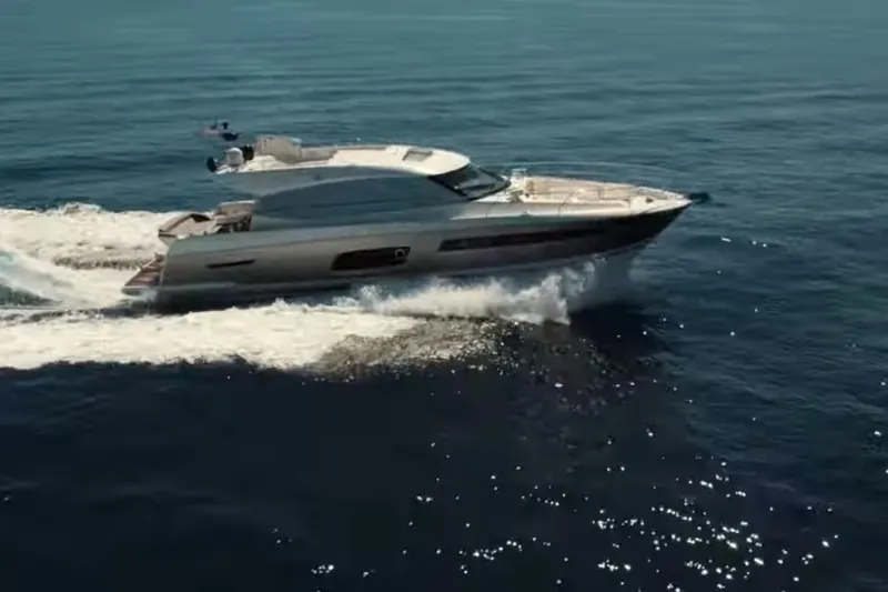  Yacht Photos Pics 2013 Prestige 550 S yacht cruising on open water, showcasing sleek design and performance.