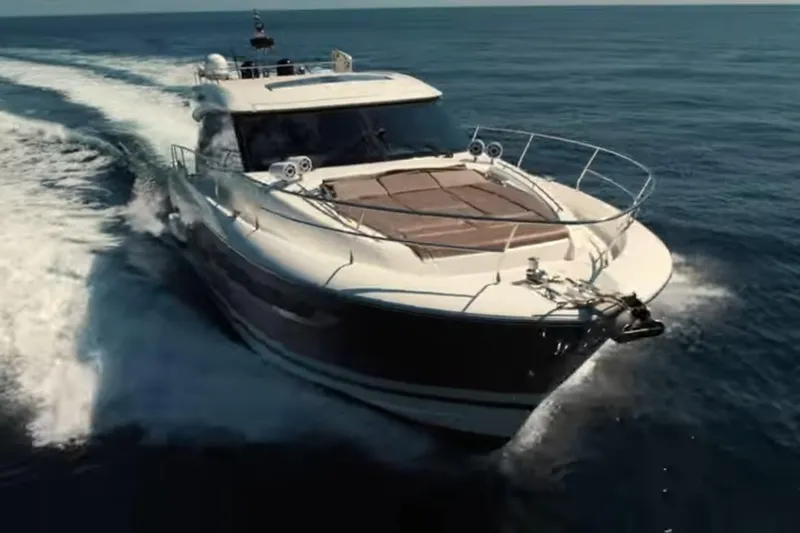  Yacht Photos Pics Luxury 2013 Prestige 550 S yacht cruising on open sea.