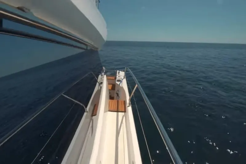  Yacht Photos Pics 2013 Prestige 550 S yacht cruising on open sea under clear blue sky.