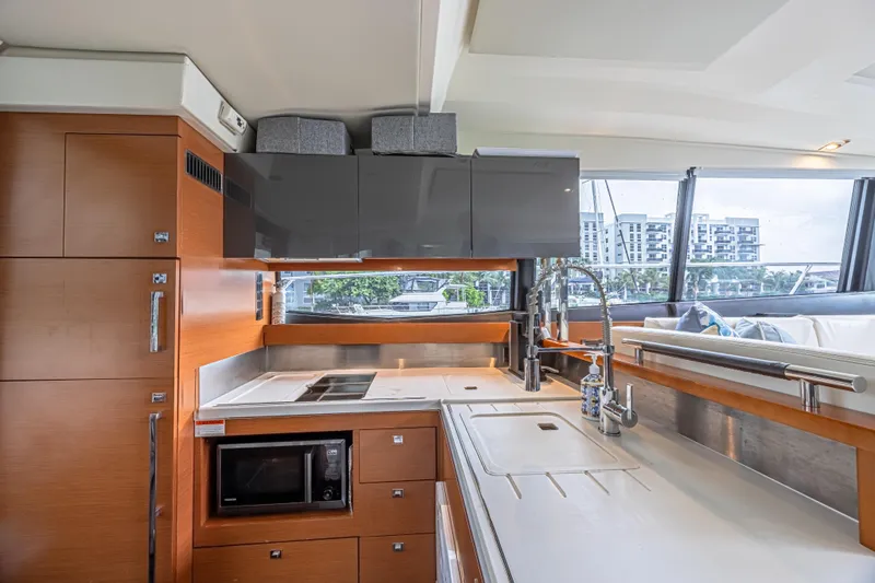  Yacht Photos Pics Luxurious kitchen interior of 2013 Prestige 550 S yacht with modern amenities.