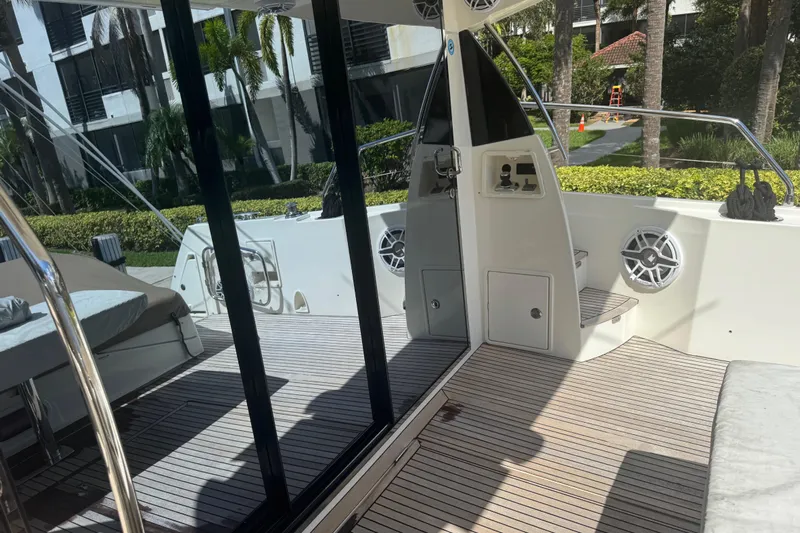  Yacht Photos Pics Prestige 550 S yacht deck, 2013 model, featuring sleek design and modern amenities.