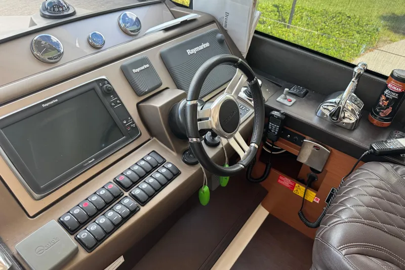  Yacht Photos Pics Control panel of a 2013 Prestige 550 S yacht with navigation equipment.